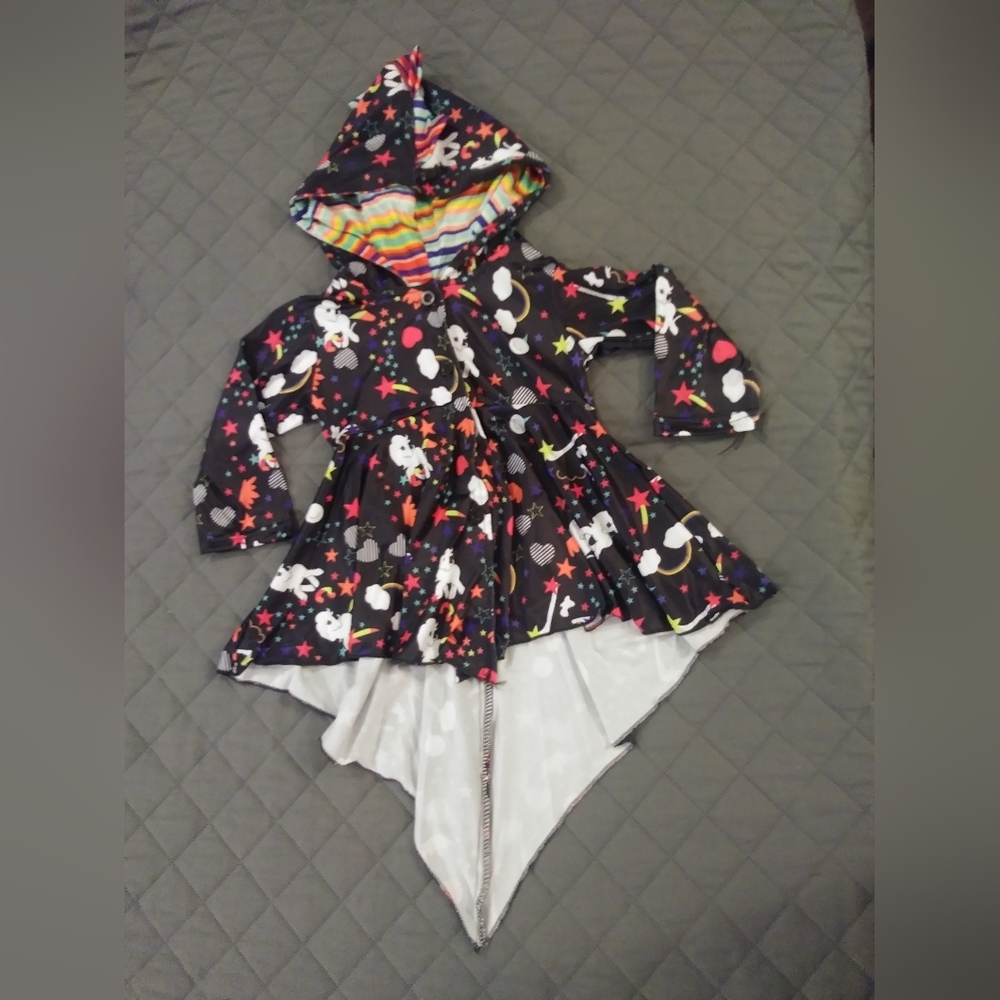 Colorful Hooded Jacket with Galaxy And Horse Print and a Dinosaur Spine.